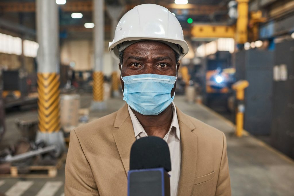 Journalist reporting news during pandemic